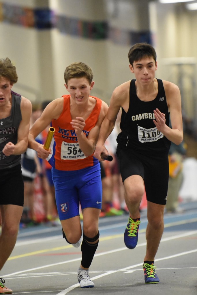 Sophomore Noah Whiting battles for position as the lead off leg in the 4 X 800-meter relay at DCL Championships. Photo courtesy of John Sangiolo