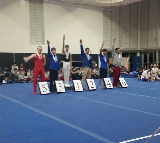 Freshman Sam Arber on the first place podium after winning the boys' gymnastics all-around individual state title. Photo courtesy of NSHS Athletics